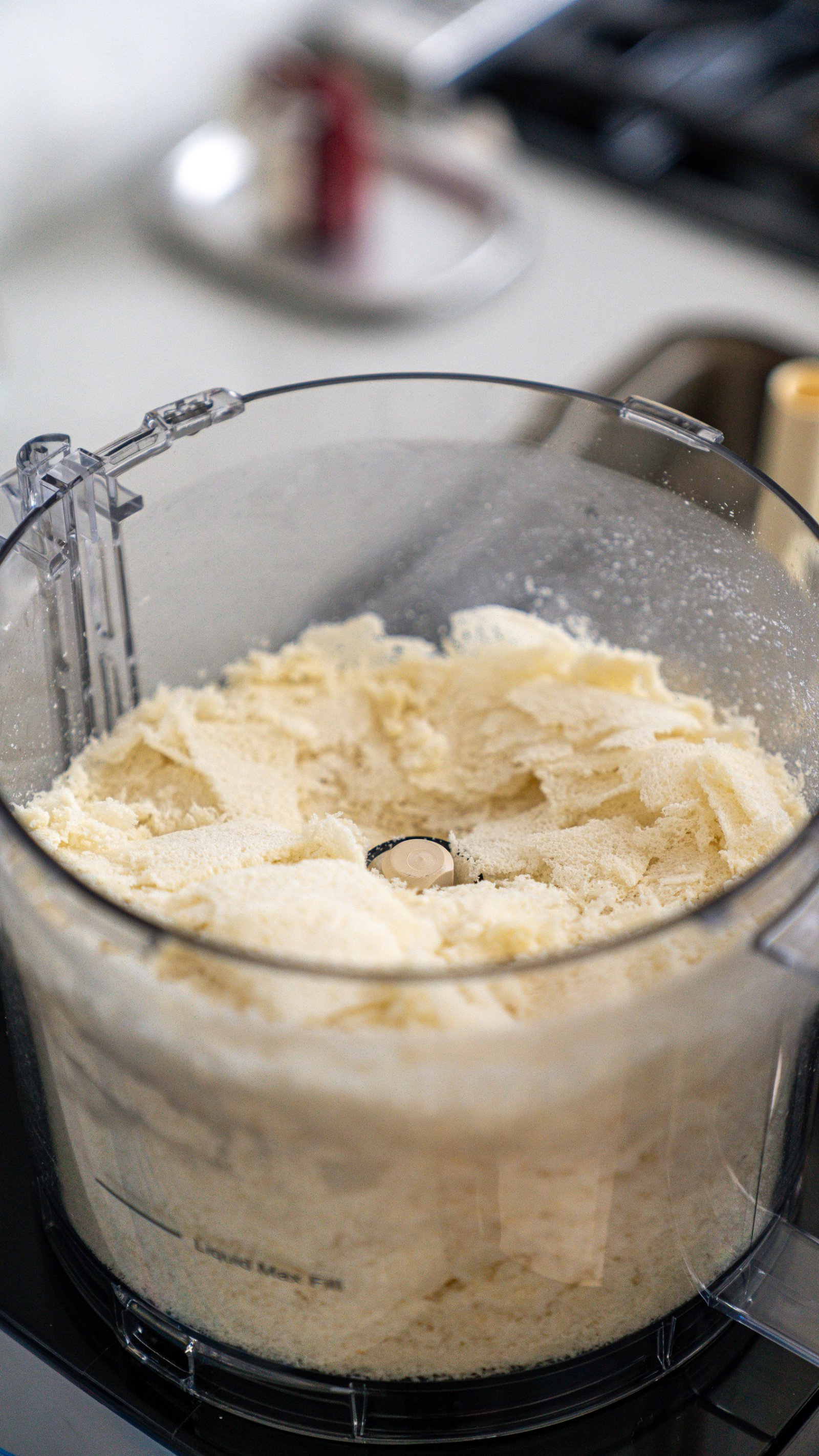 Shredded shokupan being processed into fresh nama panko